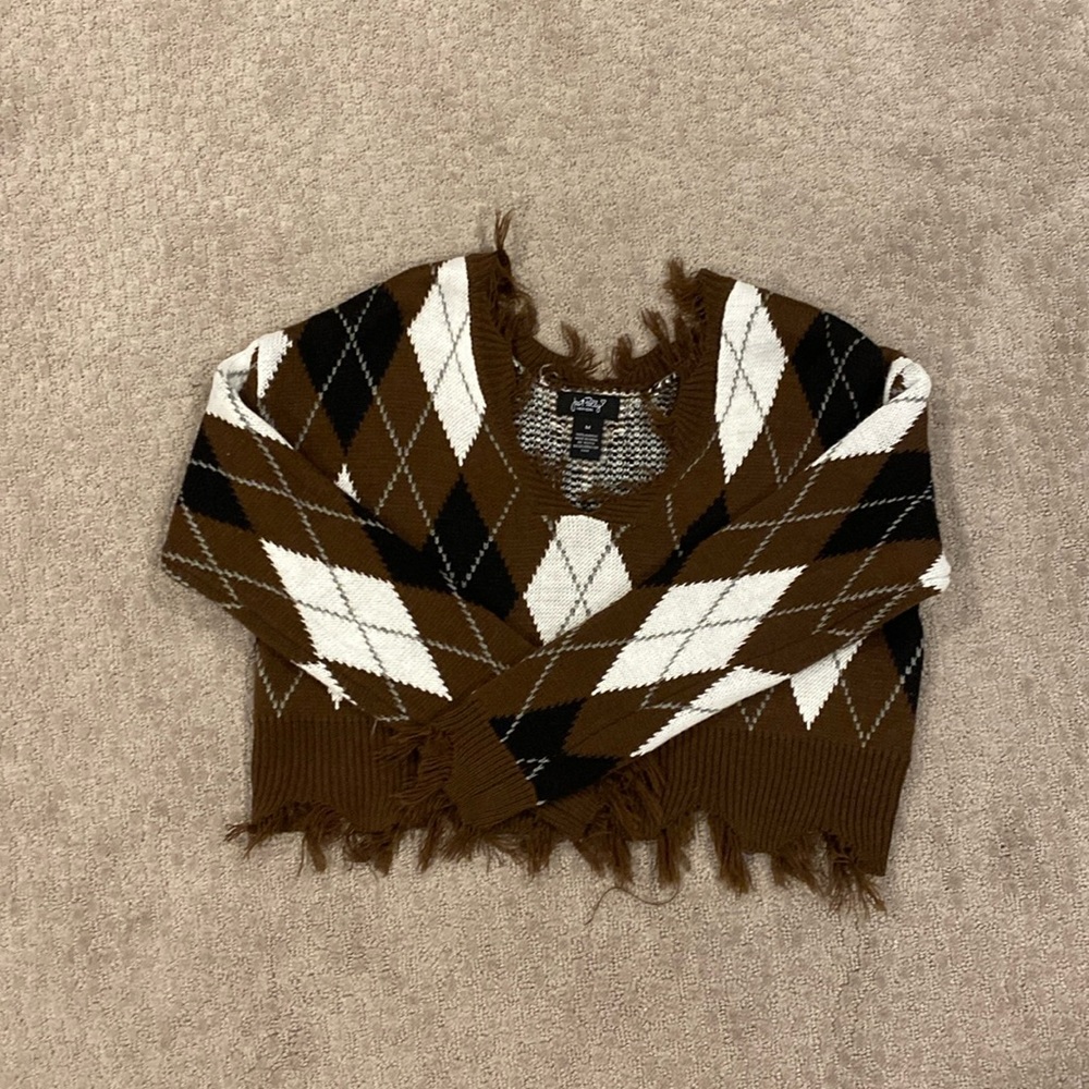 shredded cardigan from just polly new york